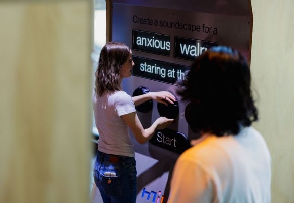 A person operates the prompt kiosk