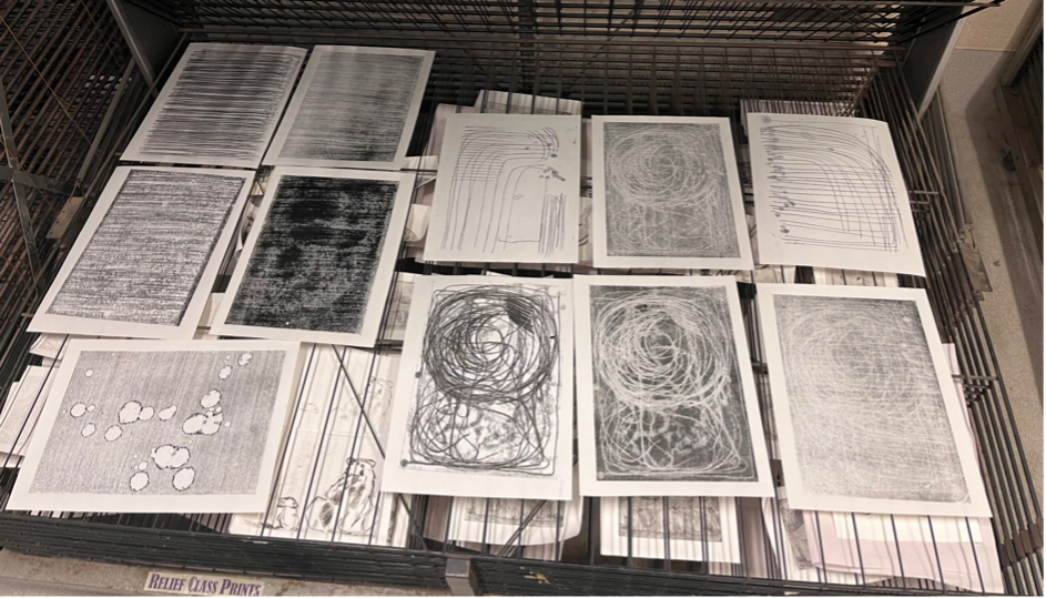 A selection of prints on the drying rack